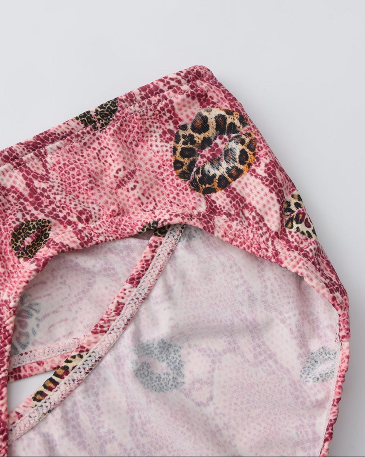 BSZN Wild Kiss Animal-Print Cutout Brief — Pink waist and leg opening detail.