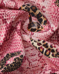 BSZN Wild Kiss Animal-Print Cutout Brief — Pink snakeskin and kiss motif close-up.