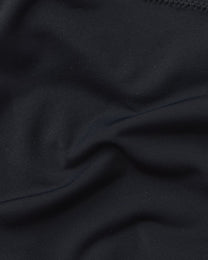 Close-up of smooth black stretch fabric