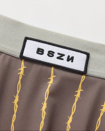 BSZN Thorn-Stripe Slash-Cut Brief, gray logo waistband detail