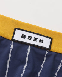 BSZN Thorn-Stripe Slash-Cut Brief, blue logo waistband detail
