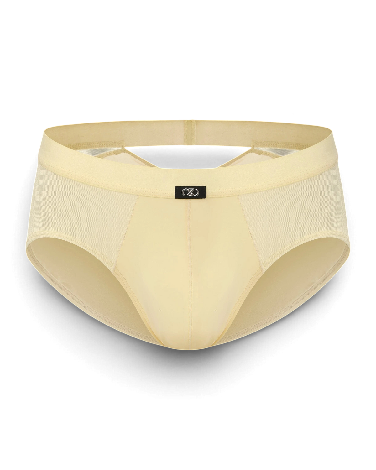 BSZN V-Cut Mesh Brief in beige, featuring a sculpted front panel, semi-sheer mesh sides, and a branded center tag.