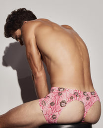 BSZN Wild Kiss Open-Back Trunk — Pink open back on seated model.